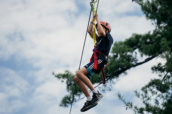 Child on zip line Easter Holidays