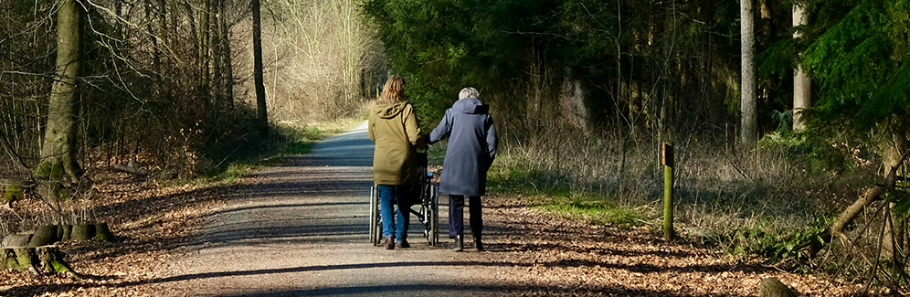 two women with a wheelchair