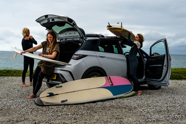 BYD car at Boardmasters with surfers