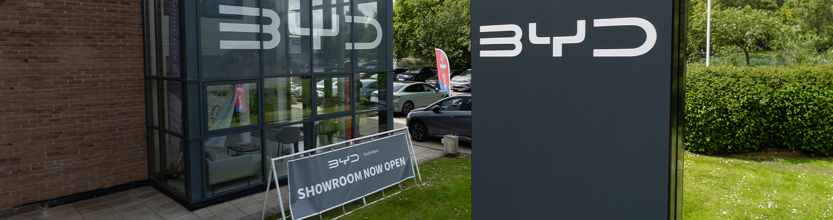 BYD Showroom now open sign