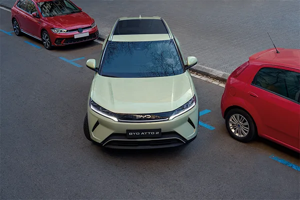 BYD ATTO 2 in green reverse parking
